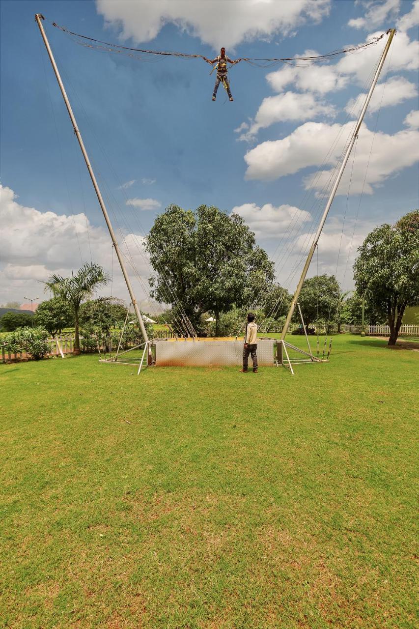 Aamby Valley City Lonavla Exterior foto The trampoline at the park